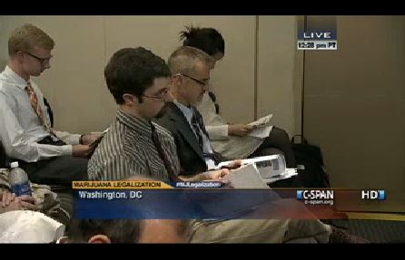 The author, featured in a screen capture of C-SPAN coverage of the Brookings Institution event called, "The Politics of Marijuana Legalization." To the author's left, John Walsh of the Washington Office on Latin America.